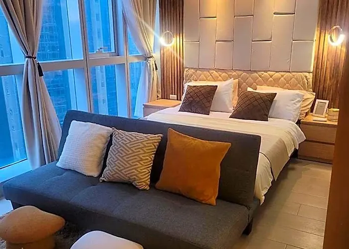 Отель Staycations Up Above 13 At Bgc