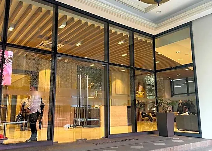 Отель Staycations Up Above 13 At Bgc Манила