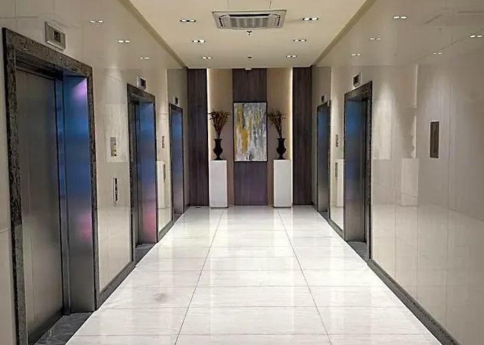 Отель Staycations Up Above 13 At Bgc